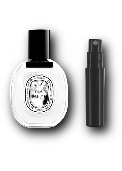 Diptyque L’Eau Papier Eau de Toilette – alkuperäinen hajuvesipullo ja musta näytesuihkepullo vierekkäin